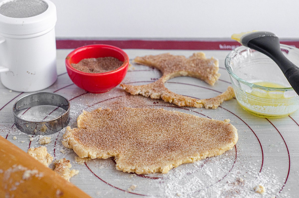 rolled out pie crust dough to make pie crust cookies