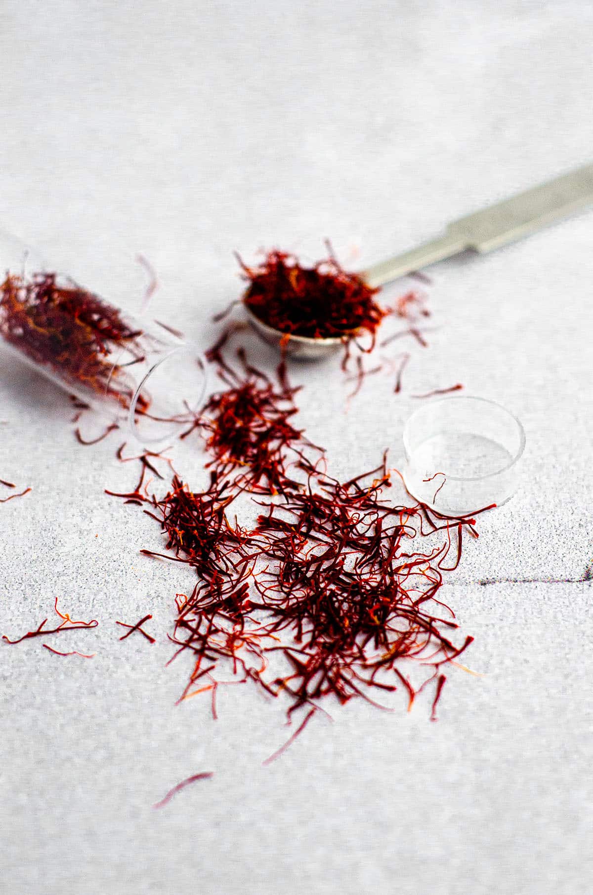 saffron threads spilling out of a tube