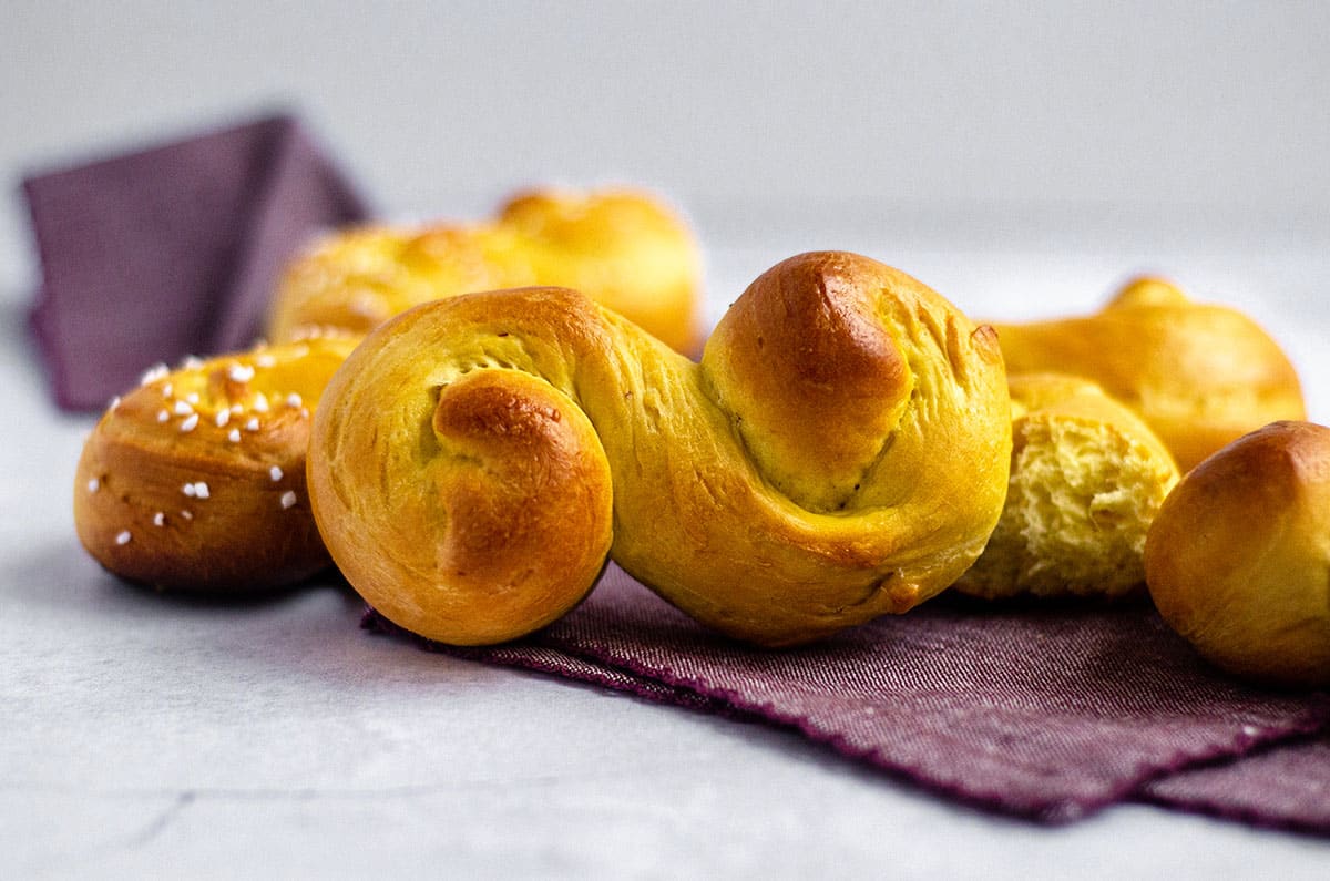 saffron bun on a purple kitchen towel