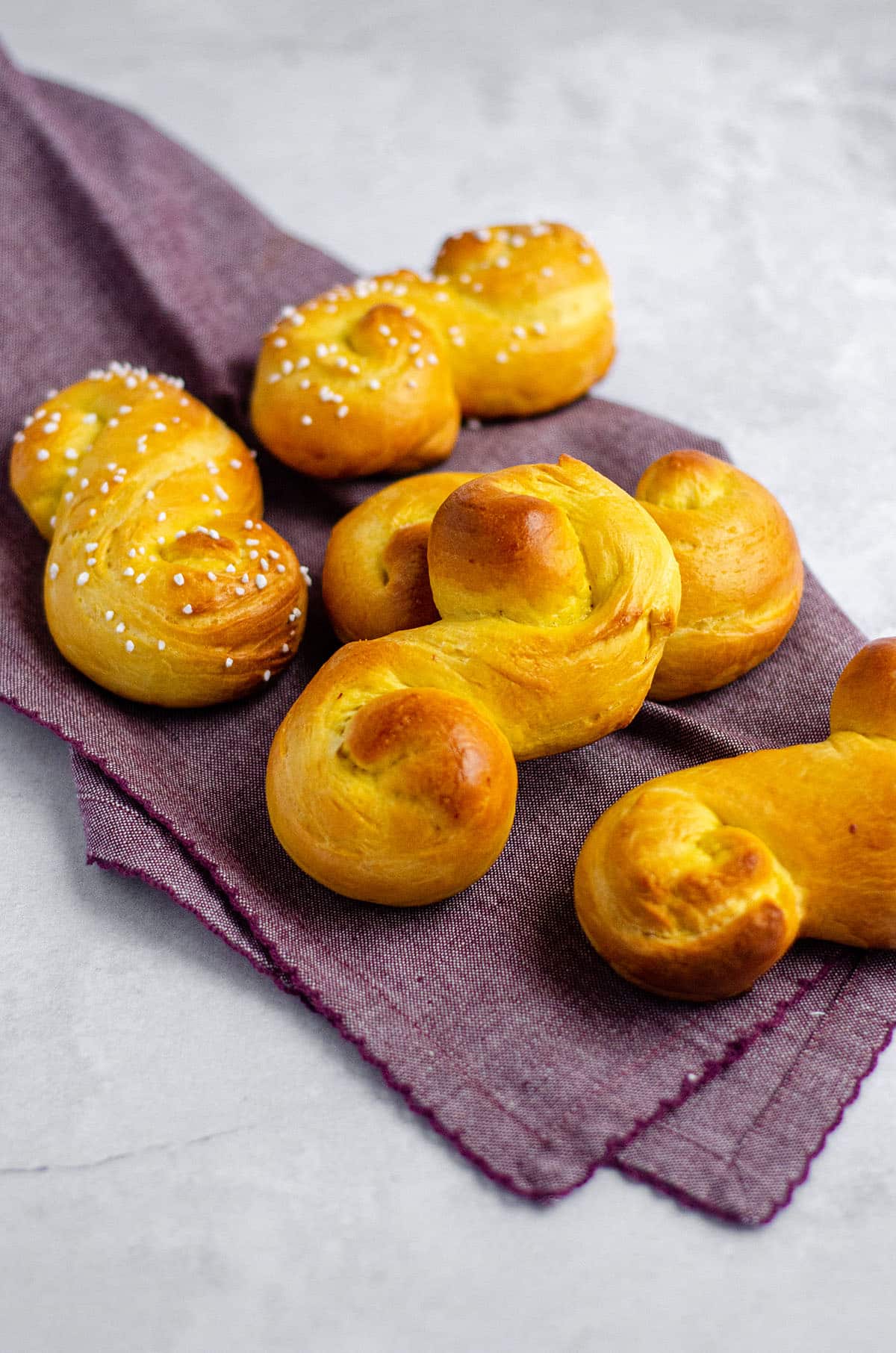 saffron buns on a purple kitchen towel