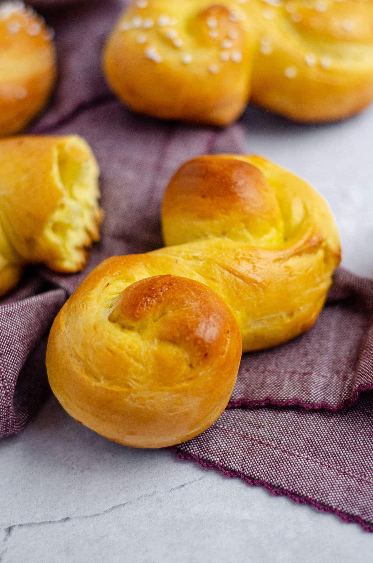 saffron bun on a purple kitchen towel