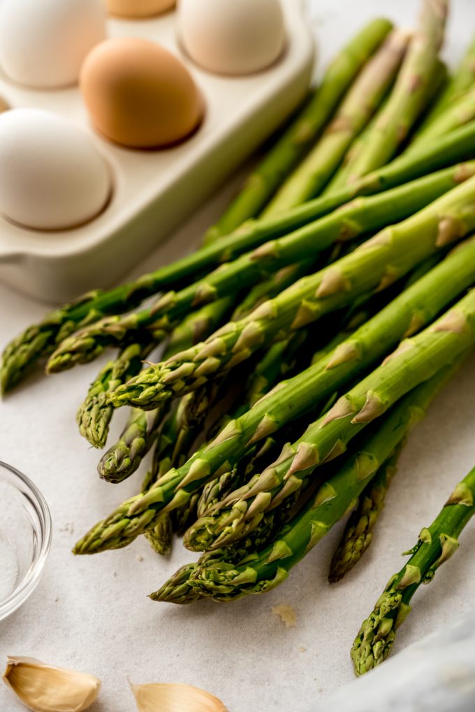 A chunk of asparagus stalks on a surface.