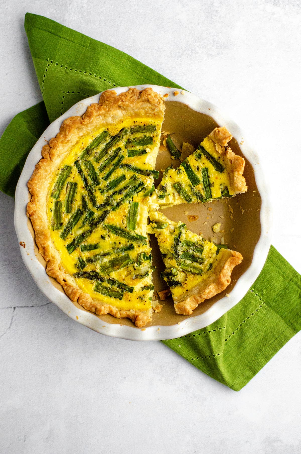 Asparagus Quiche: A simple egg quiche loaded up with asparagus and cheese. Pair with my favorite homemade pie crust or go crustless!