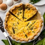 Aerial photo of a sliced asparagus quiche.
