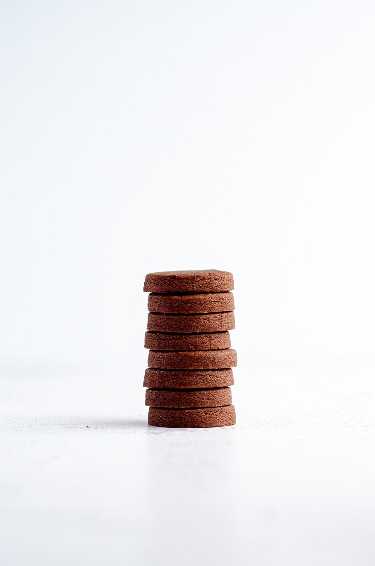 stack of chocolate cut-out sugar cookies