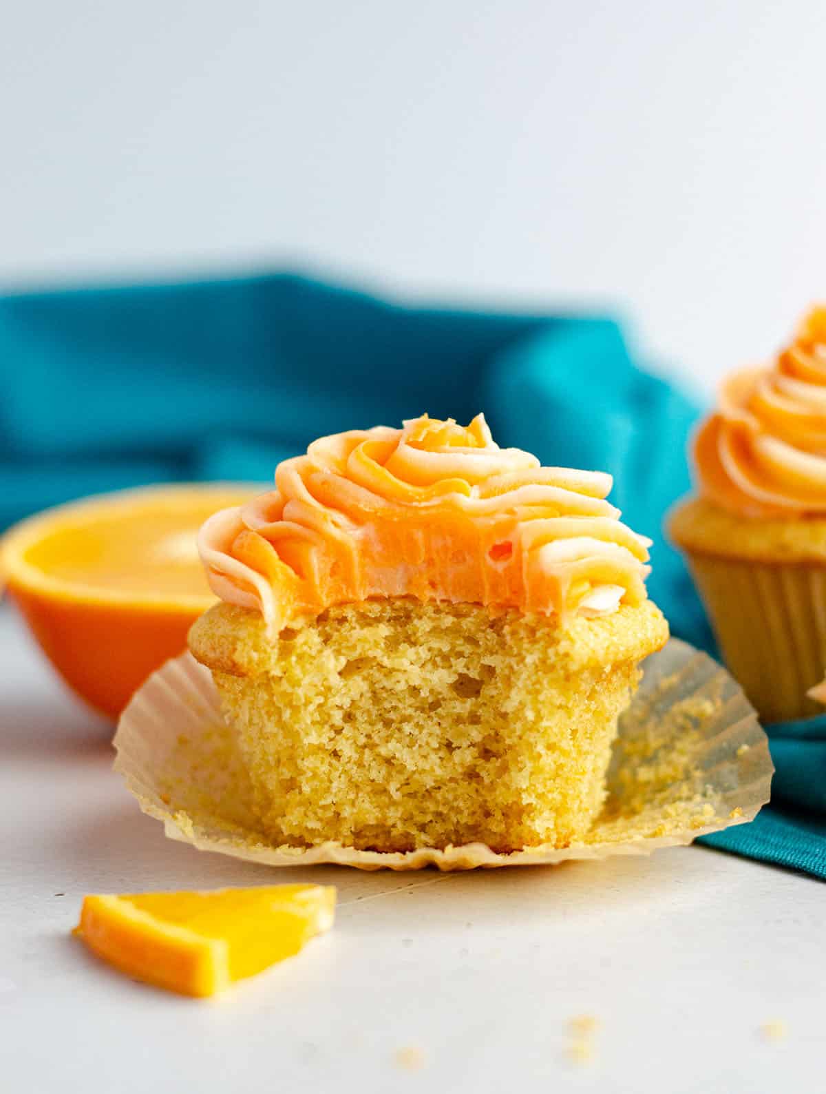 Orange Creamsicle Cupcakes: Simple orange cupcakes topped with swirls of orange and cream cheese frostings.
