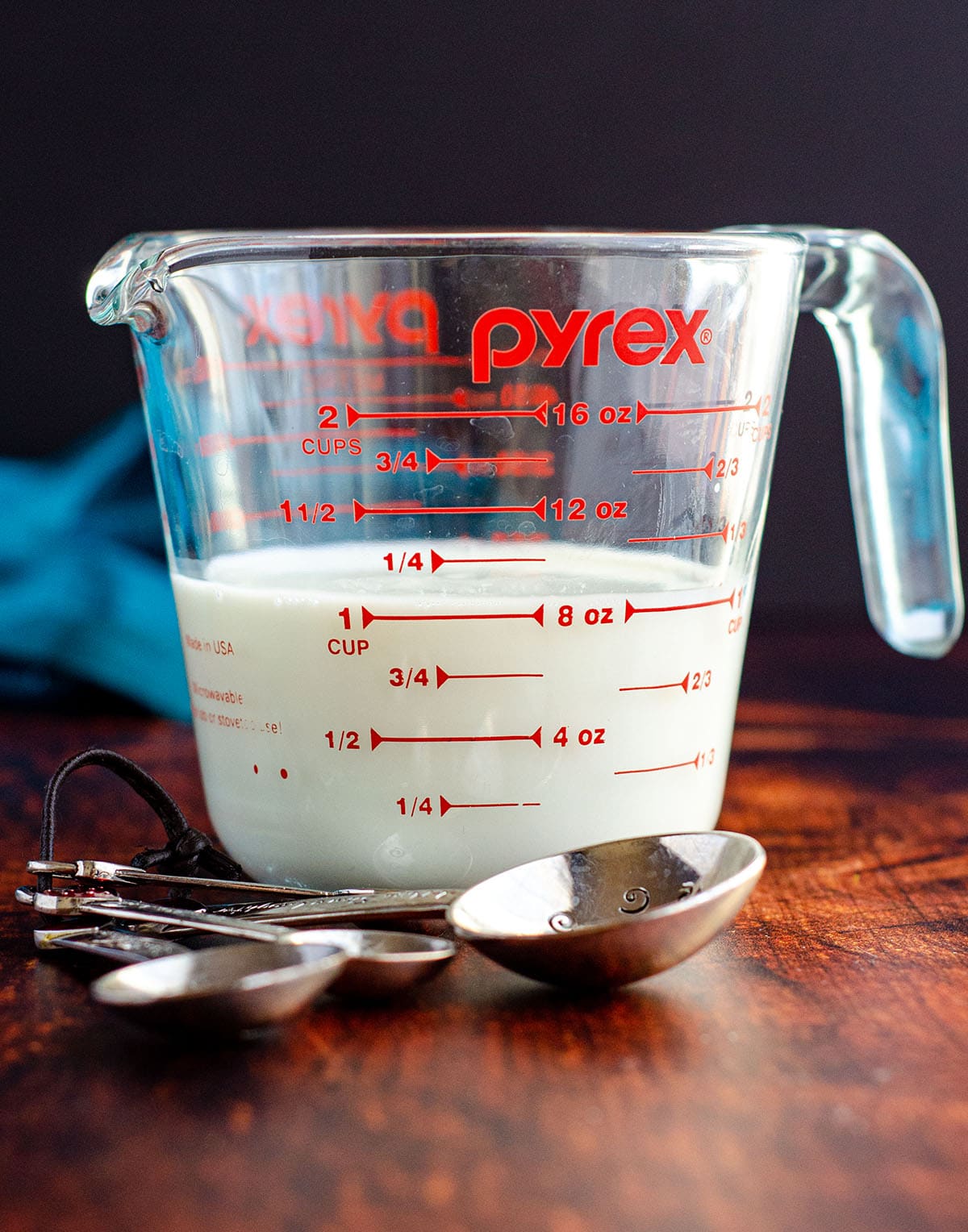 homemade buttermilk in a glass measuring cup