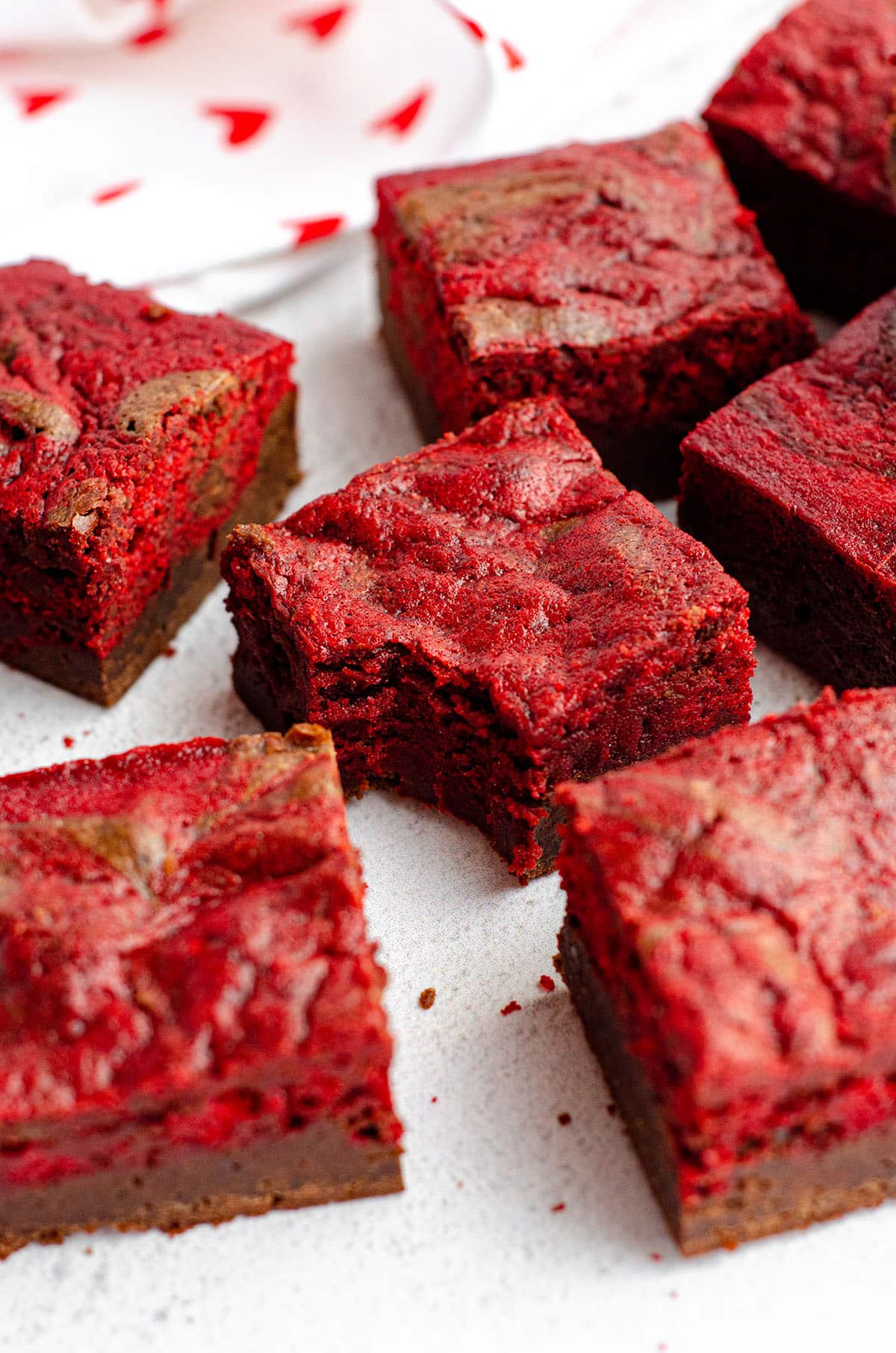 red velvet brownie with a bite taken out of it