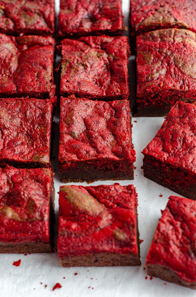 Red Velvet Brownies: Dense and fudgy brownies swirled with red velvet cake-- everything is made from scratch!