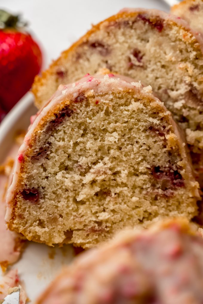 Slices of strawberry Bundt cake on a plate.