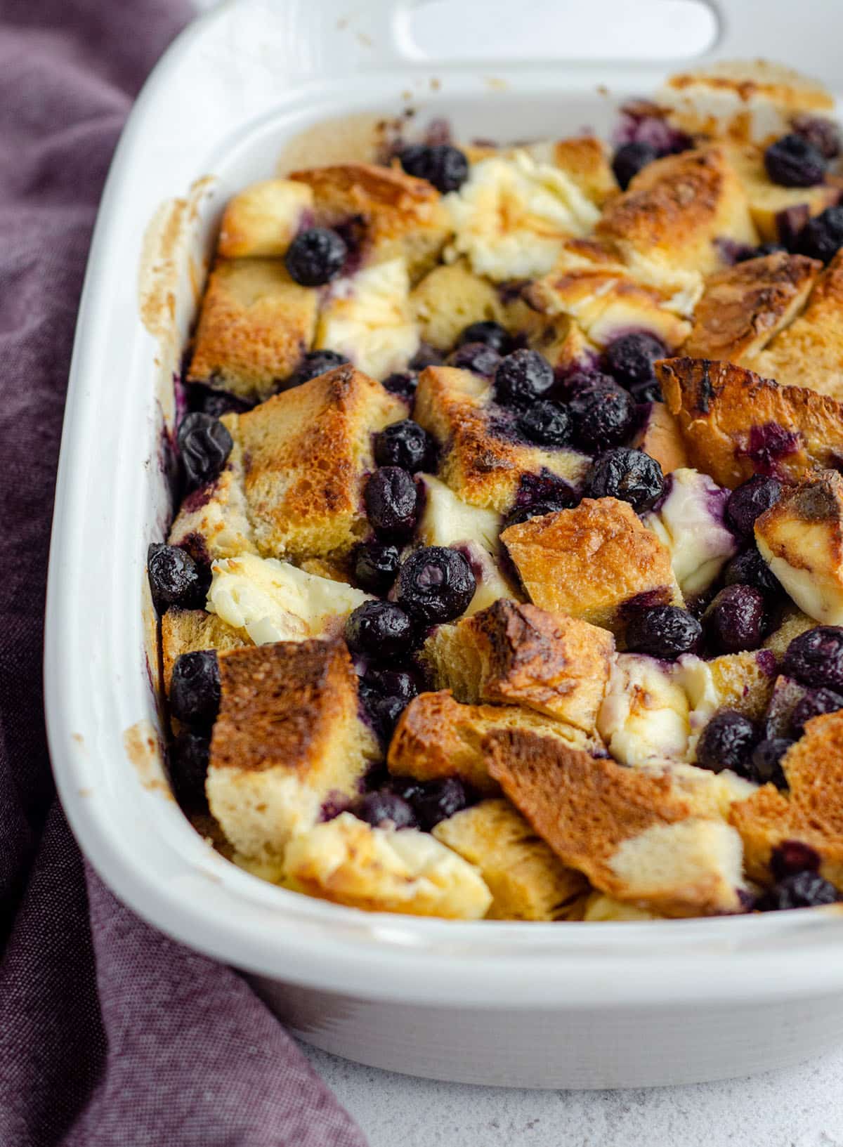baked blueberry french toast in a casserole dish