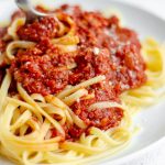 Homemade Meat Sauce: An easy homemade pasta sauce made with five simple ingredients. This recipe has been in my family for over a century and is a go-to for pasta dishes and lasagna or over vegetables or eggs.