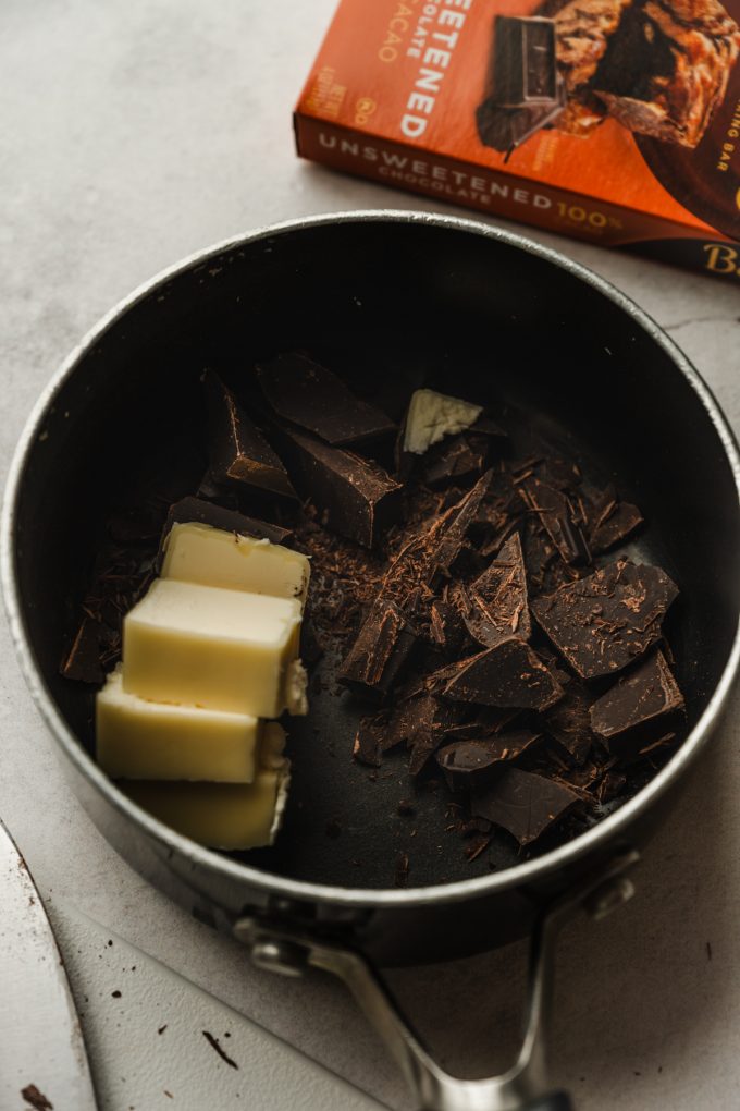 Chopped chocolate and butter in a saucepan.