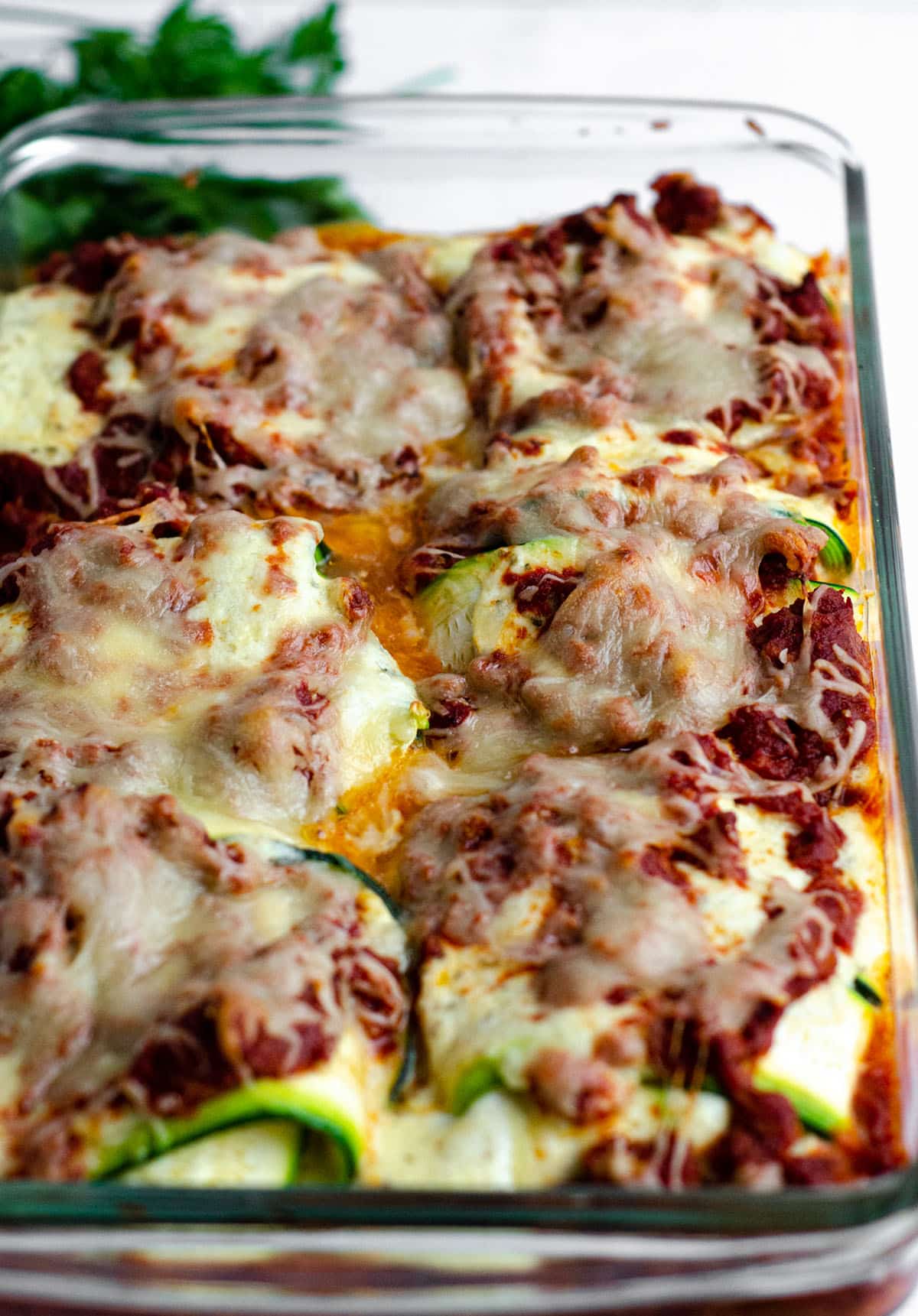 baked zucchini ravioli in a baking dish ready to serve