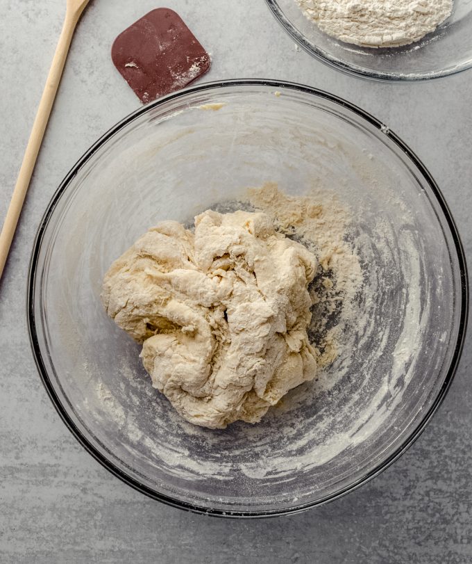 Aerial photo of homemade hot dog bun dough in a bowl.