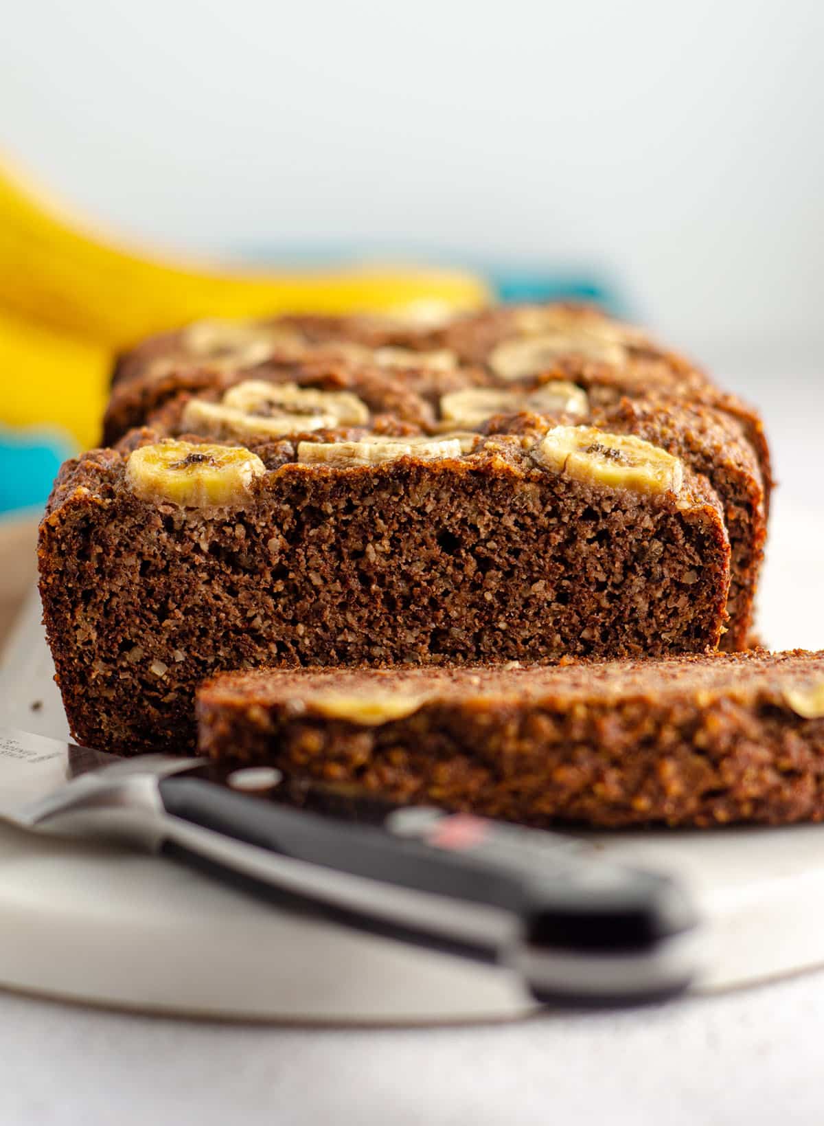 sliced almond flour banana bread on a serving platter