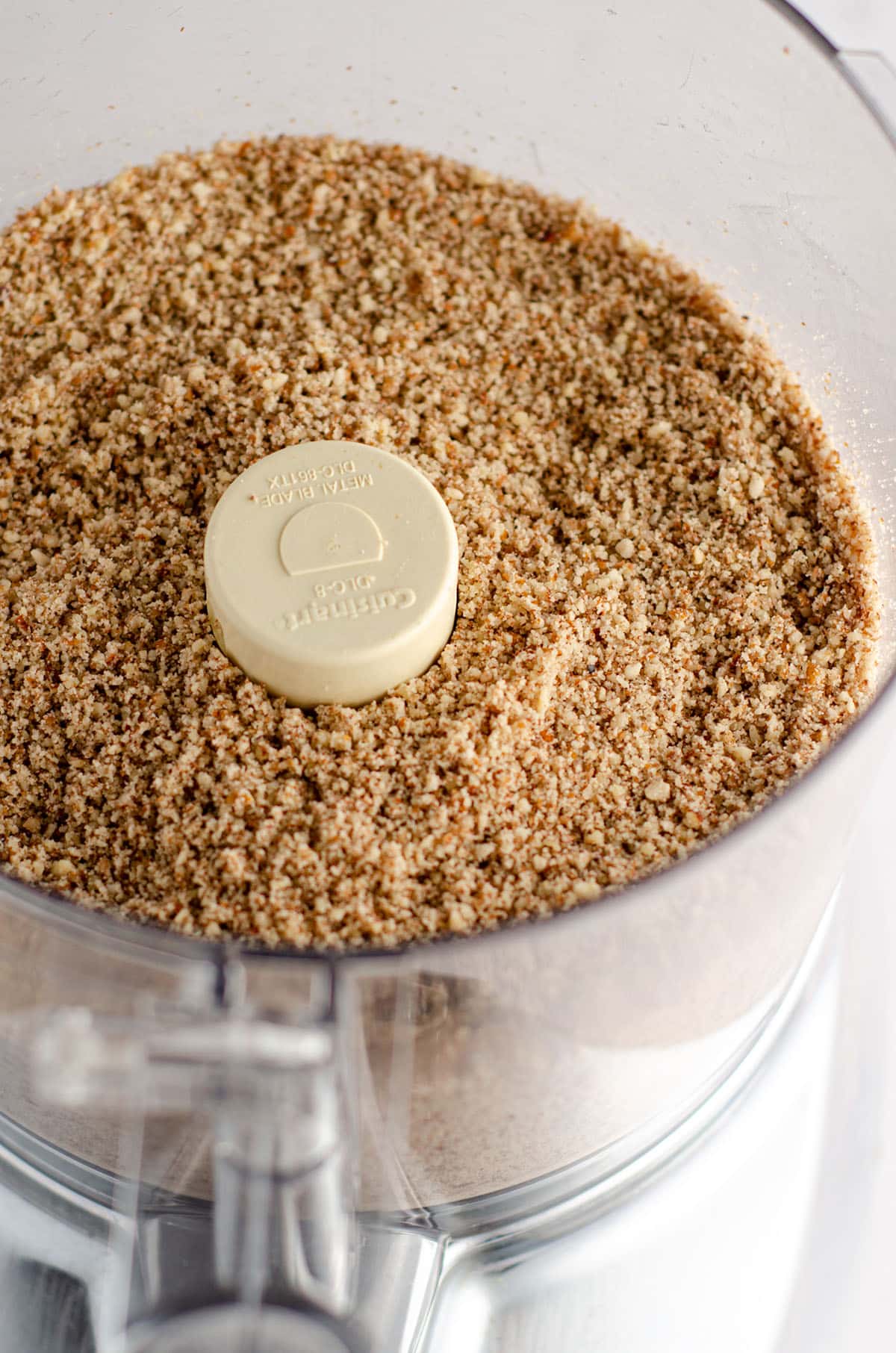 ground almonds in a food processor for almond flour banana bread