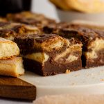 Tiramisu Brownies: These tiramisu brownies are made with a scratch brownie base, a middle layer of coffee-soaked Ladyfingers, and a top layer of sweetened mascarpone cheese.