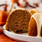 A slice of pumpkin Bundt cake on a platter.