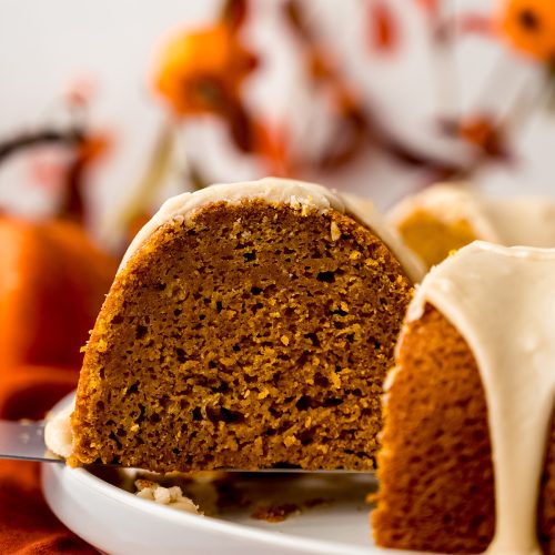 A slice of pumpkin Bundt cake on a platter.