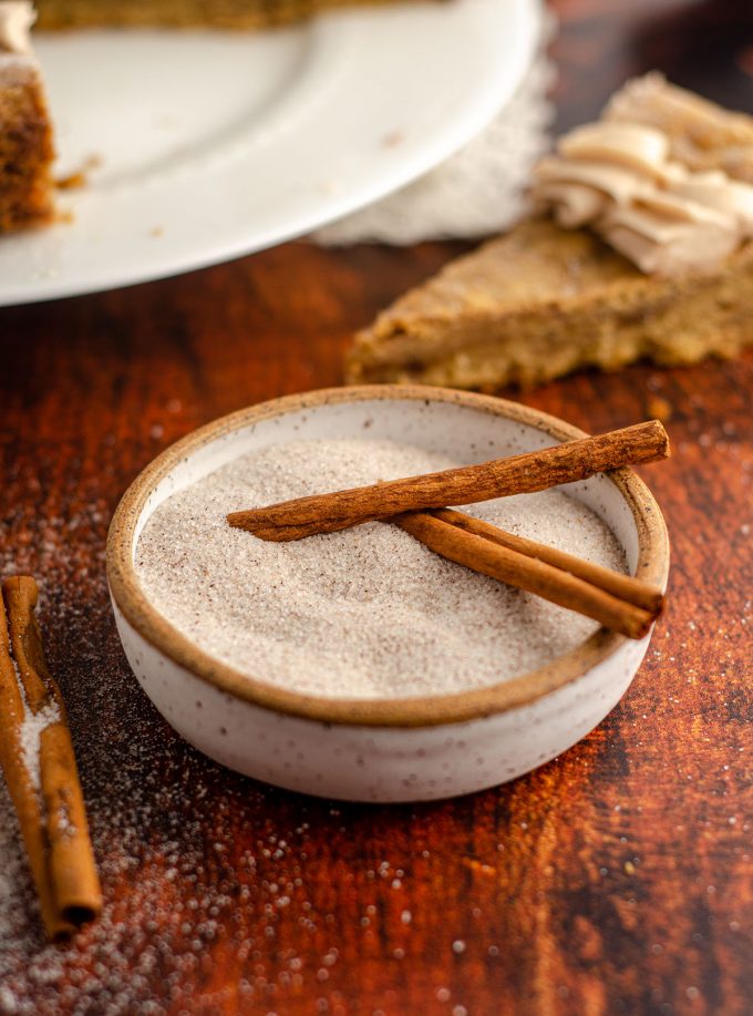 Snickerdoodle Cookie Cake: A simple brown sugar cookie base swirled with cinnamon ribbons and topped with a creamy, spiced snickerdoodle buttercream. Whip up one giant snickerdoodle cookie for your next celebration!