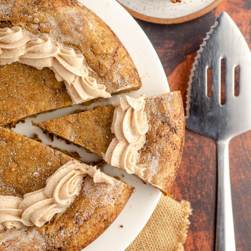 aerial photo of snickerdoodle cookie cake sliced and ready to serve