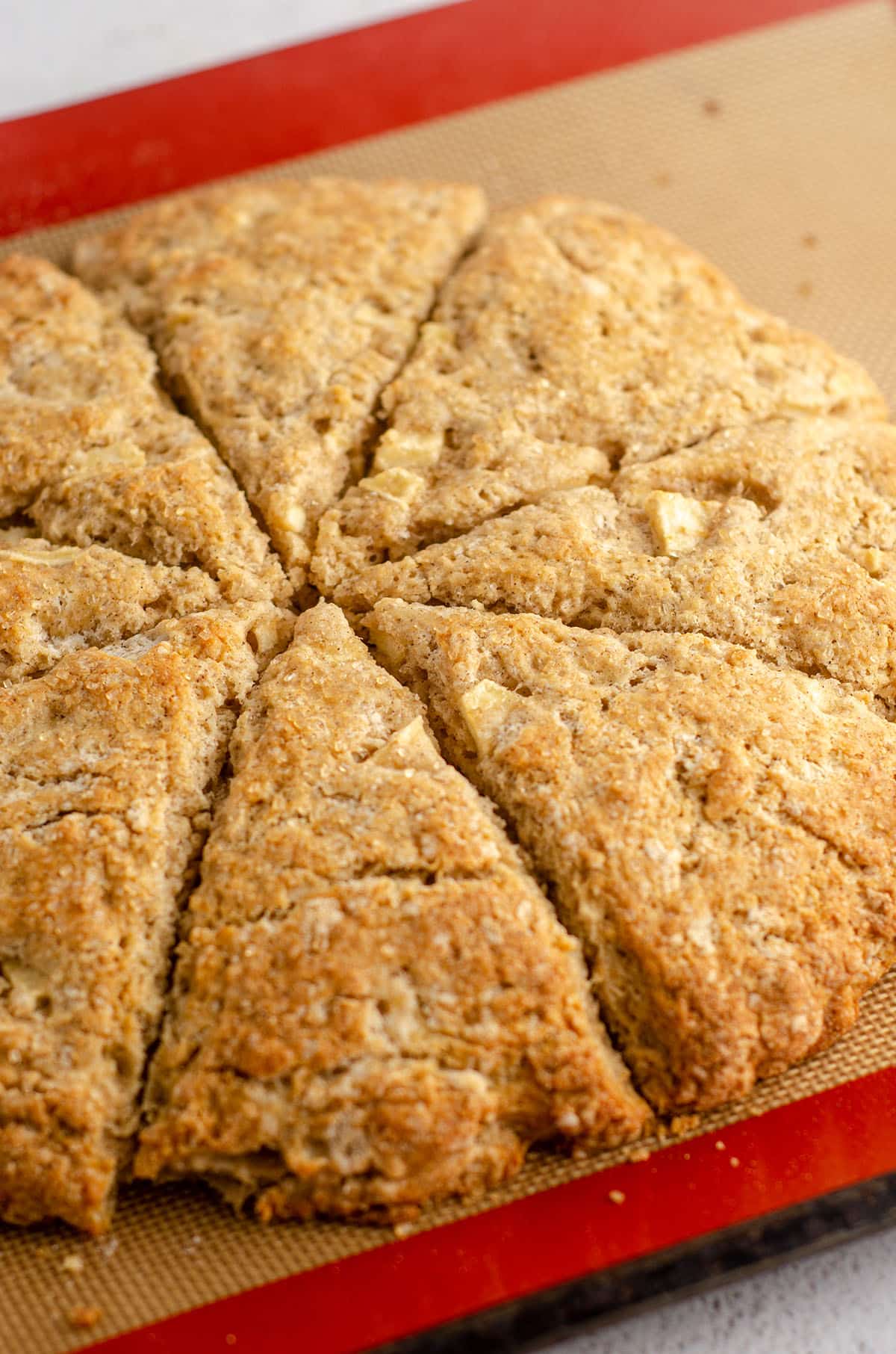 baked golden brown scones on baking sheet