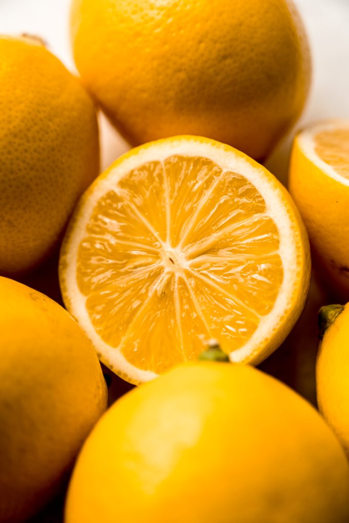 Meyer lemons in a pile.