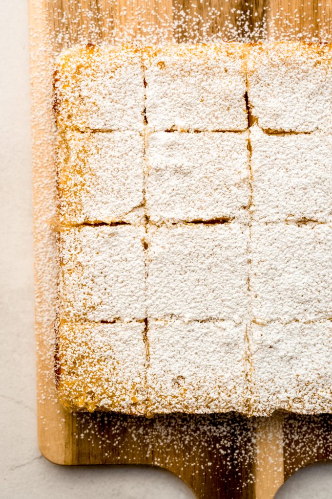 Meyer lemon bars on a cutting board.