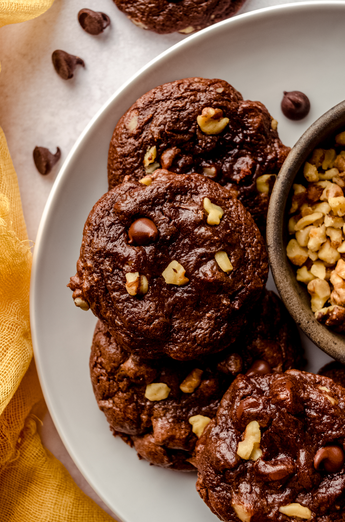 Aerial photo of brownie cookies on a plate.