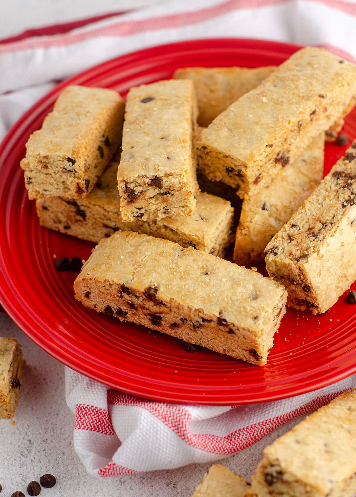 chocolate chip biscotti sitting on a red plate