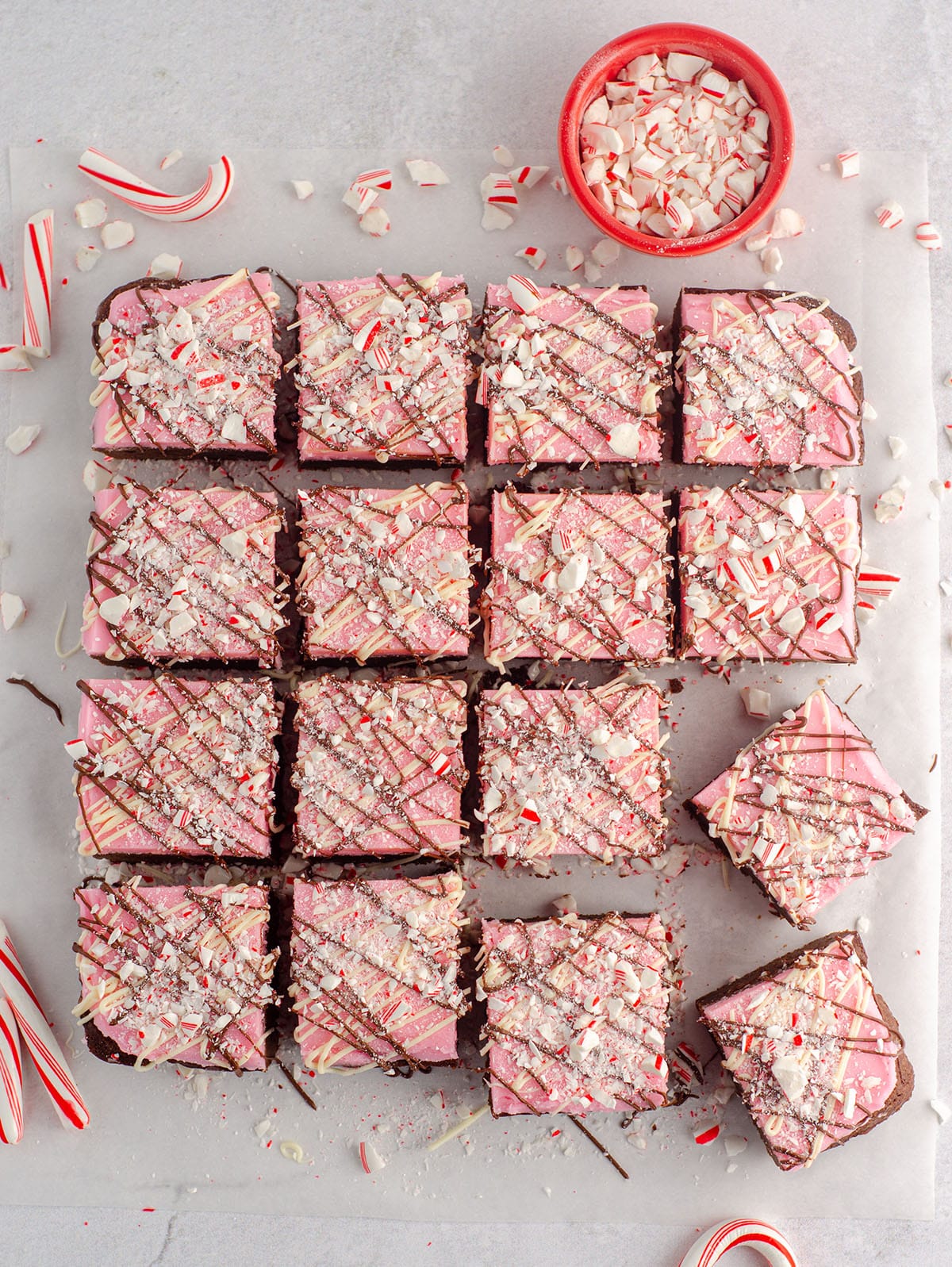 aerial photo of peppermint brownies with candy canes crushed on top