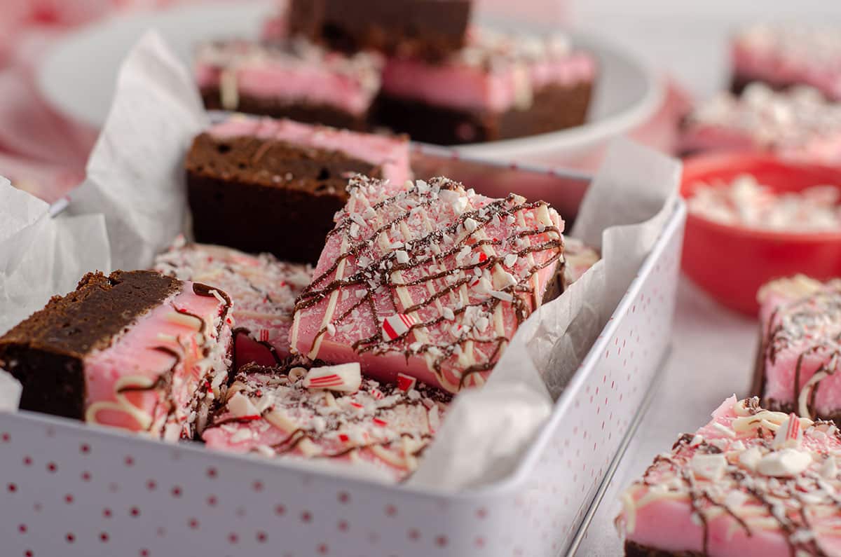 peppermint brownies sitting in a treat box ready to gift