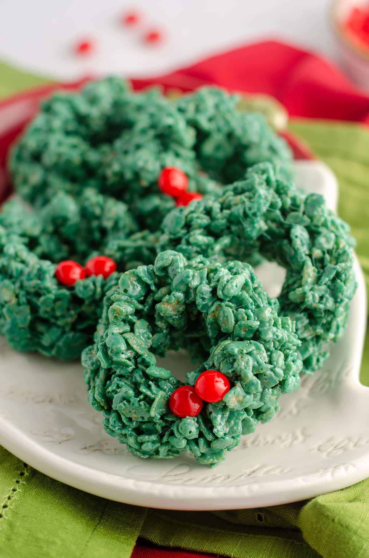 rice krispies wreaths sitting on a plate
