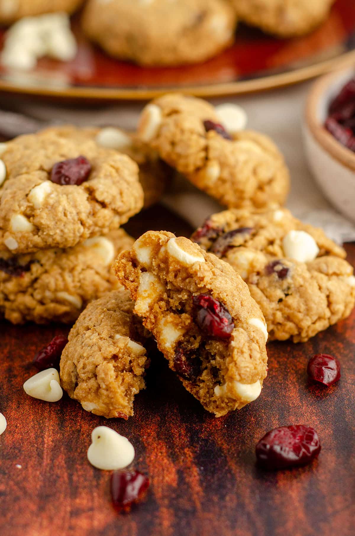 white chocolate cranberry oatmeal cookie broken apart to see the inside