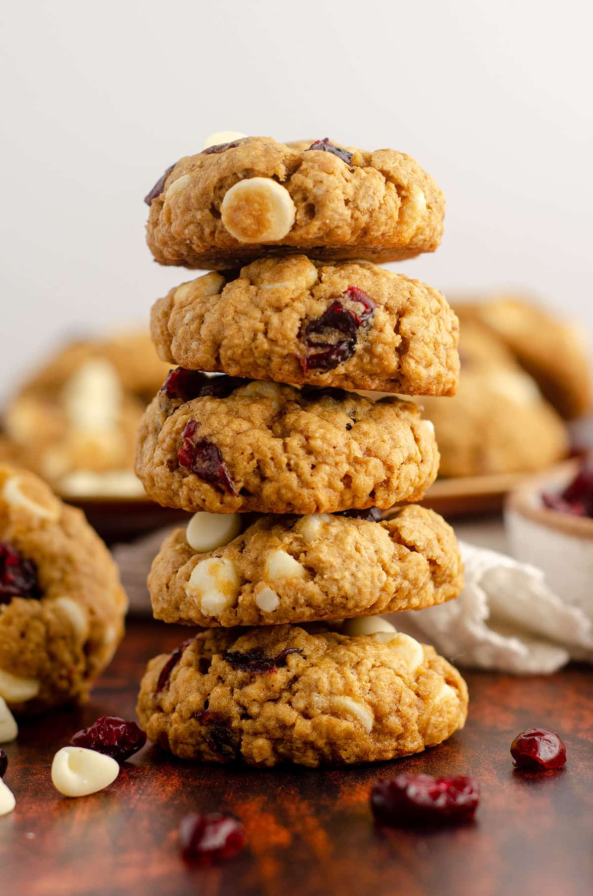tall stack of white chocolate cranberry oatmeal cookies