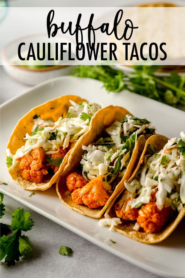 Soft tortillas filled with crunchy buffalo cauliflower and topped with a tangy cilantro slaw. A perfect gluten free, dairy free, and vegetarian option that can easily be made vegan. via @frshaprilflours
