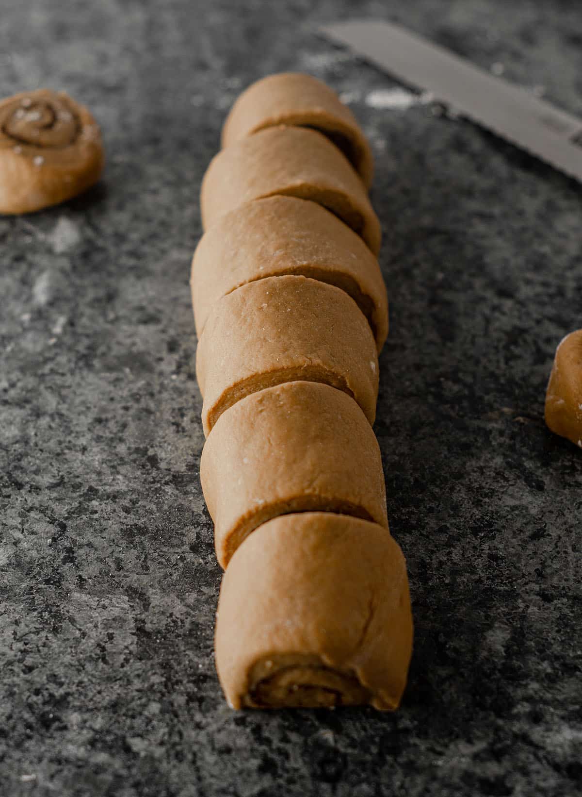 dough for coffee cinnamon rolls sliced and ready to rise