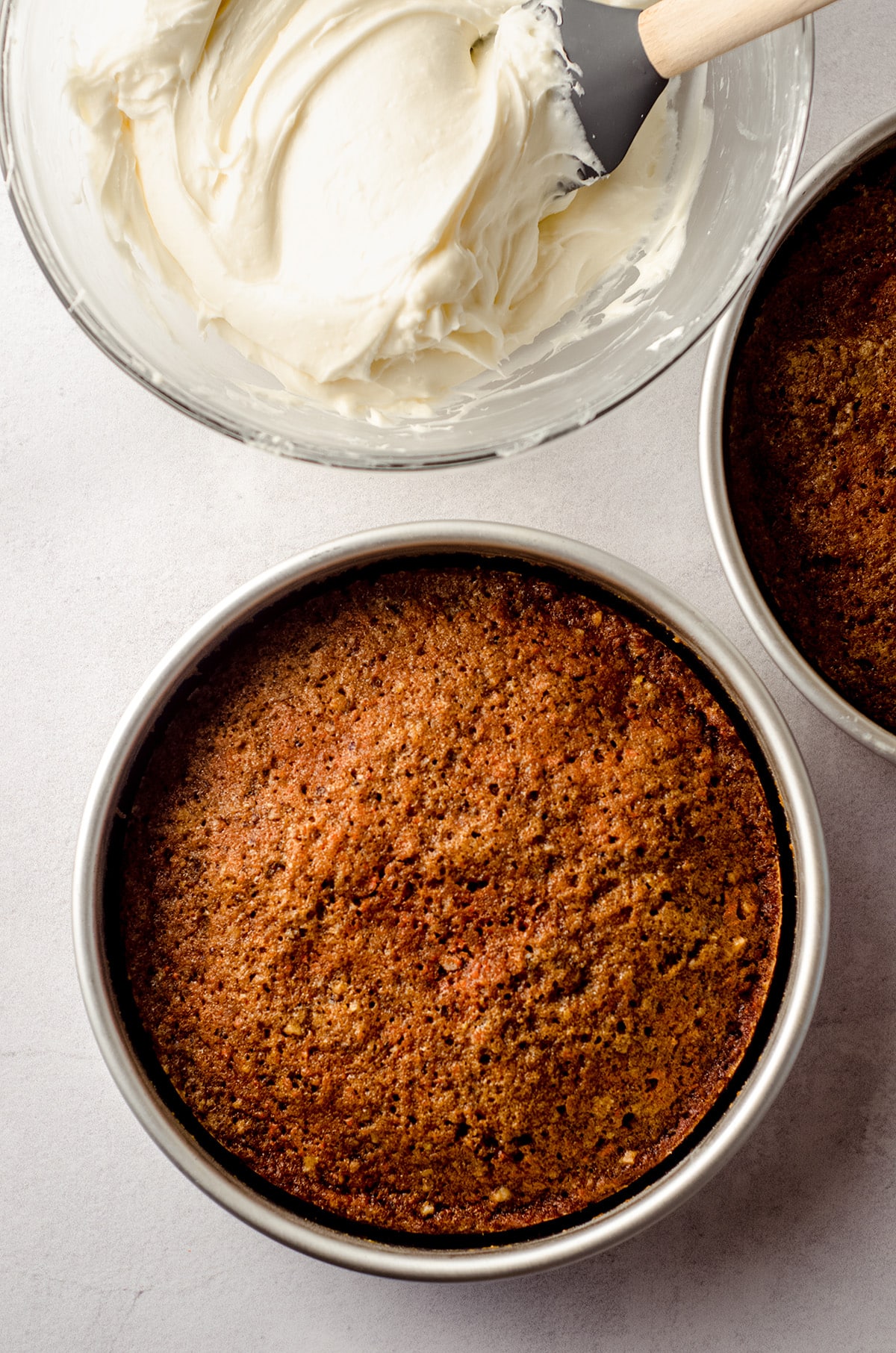 aerial photo of carrot walnut cake in baking pans