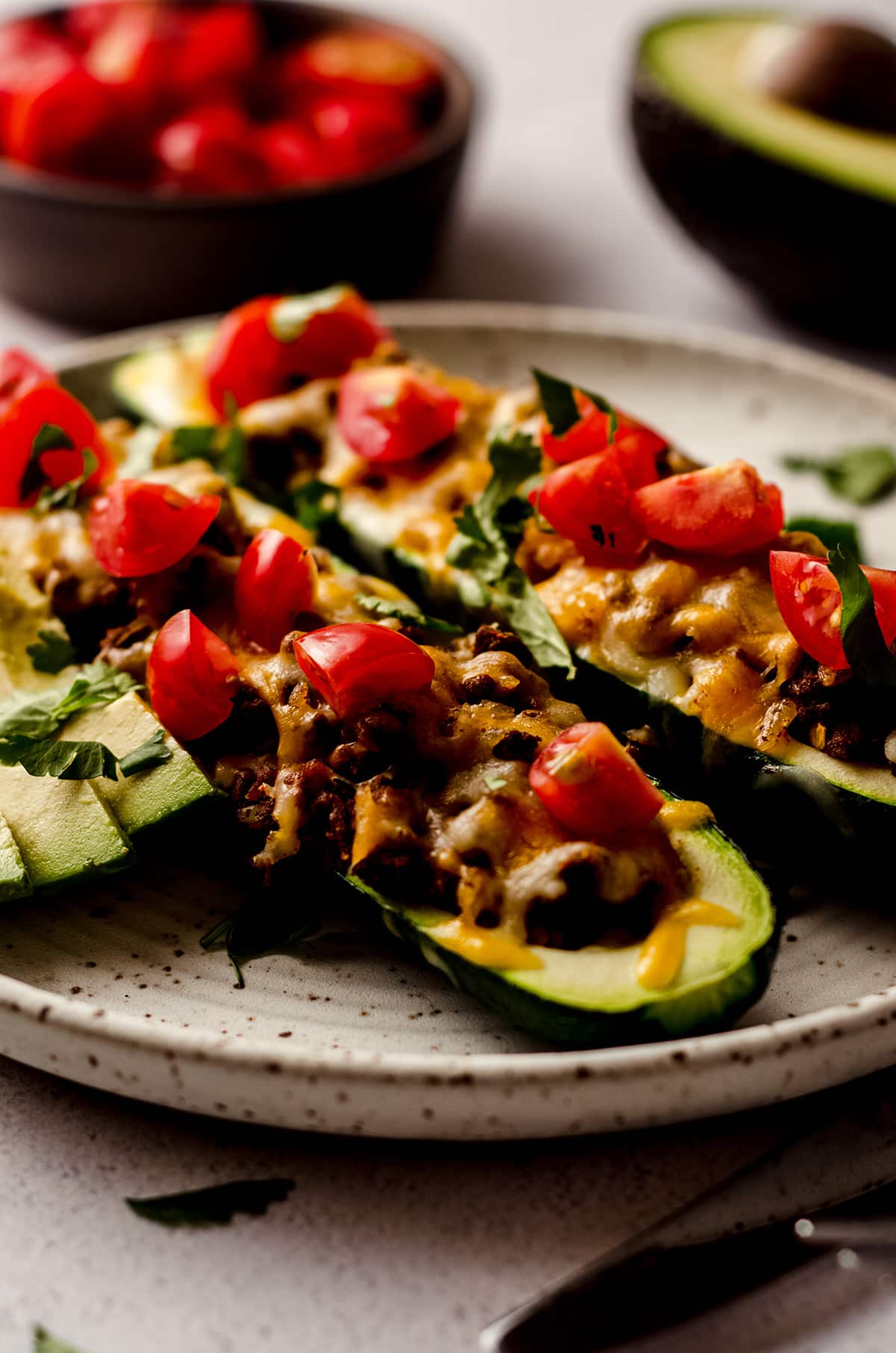 taco zucchini boats on a plate