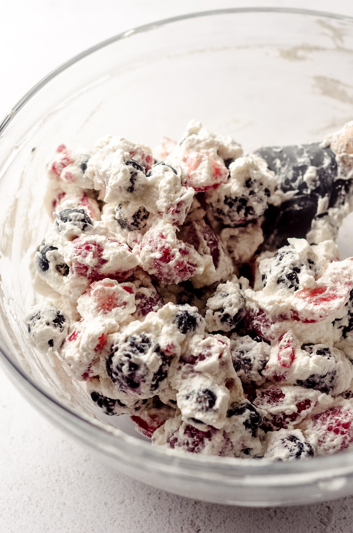 whipped cream and berry filling in a glass bowl