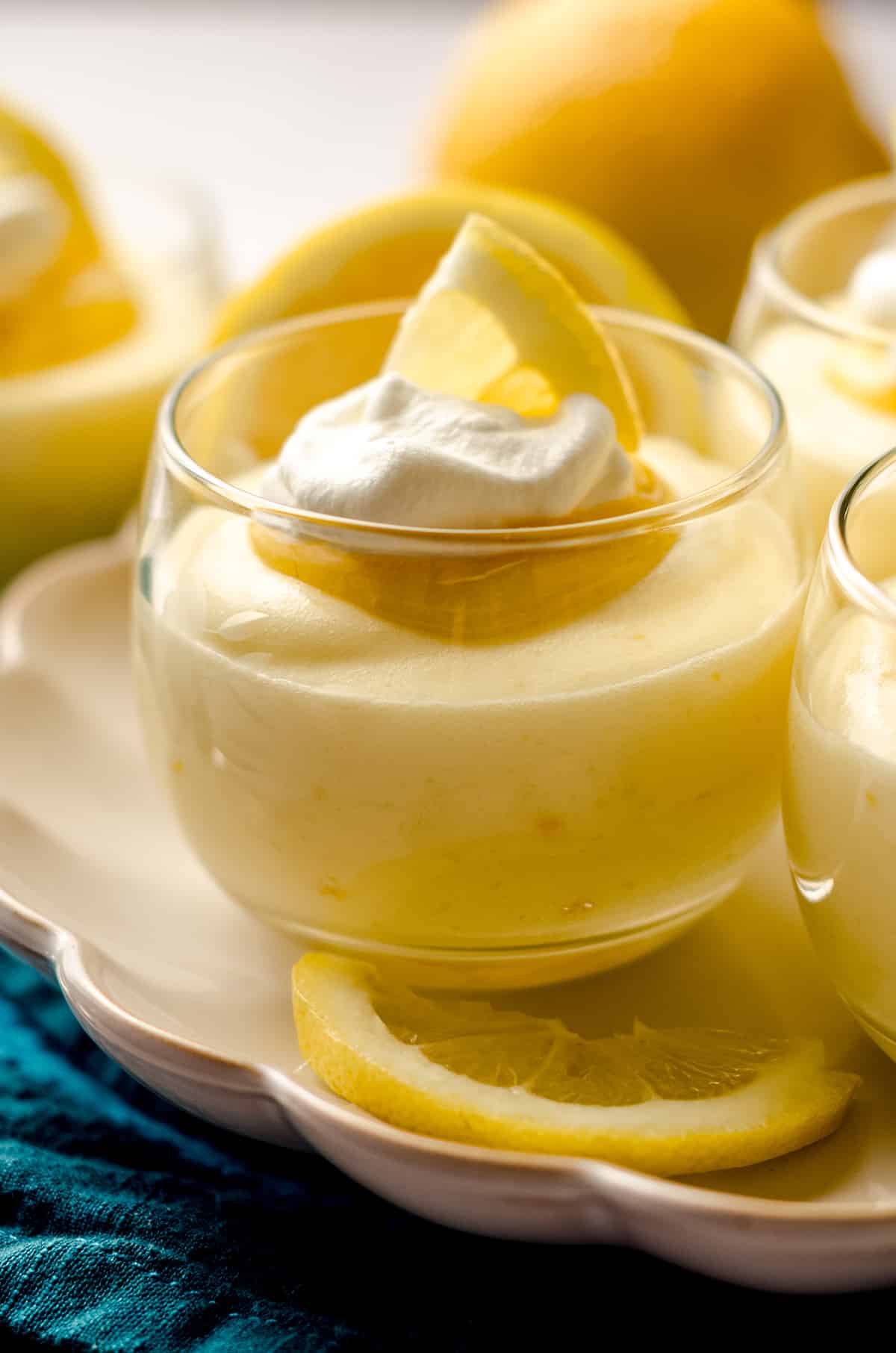 lemon mousse in cups on a plate