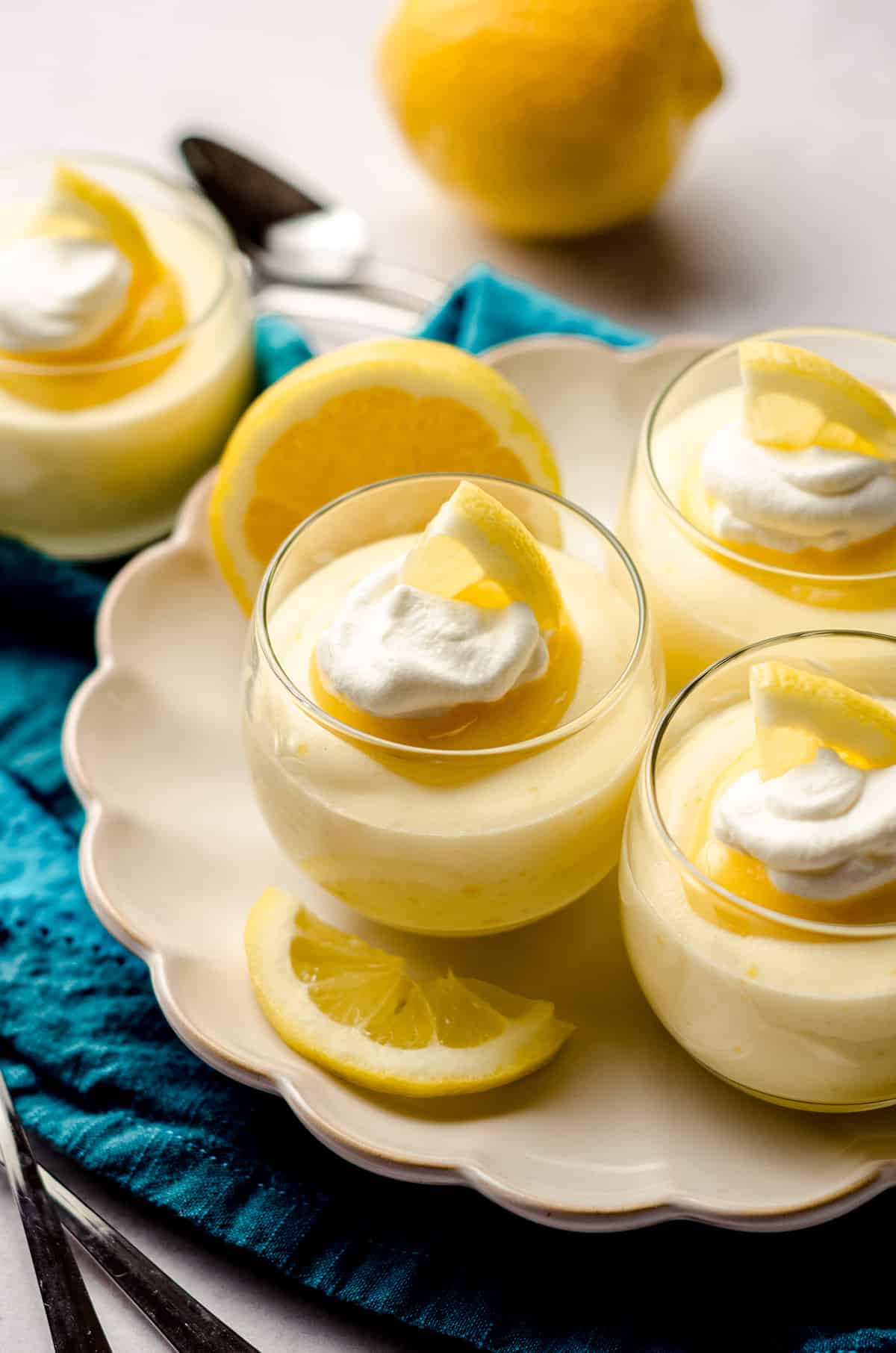 lemon mousse in cups on a plate