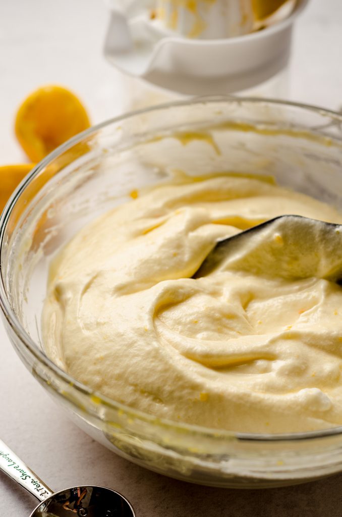 lemon mousse in a bowl ready to portion into cups