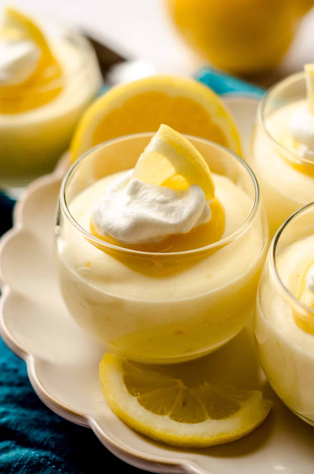 lemon mousse in cups on a plate