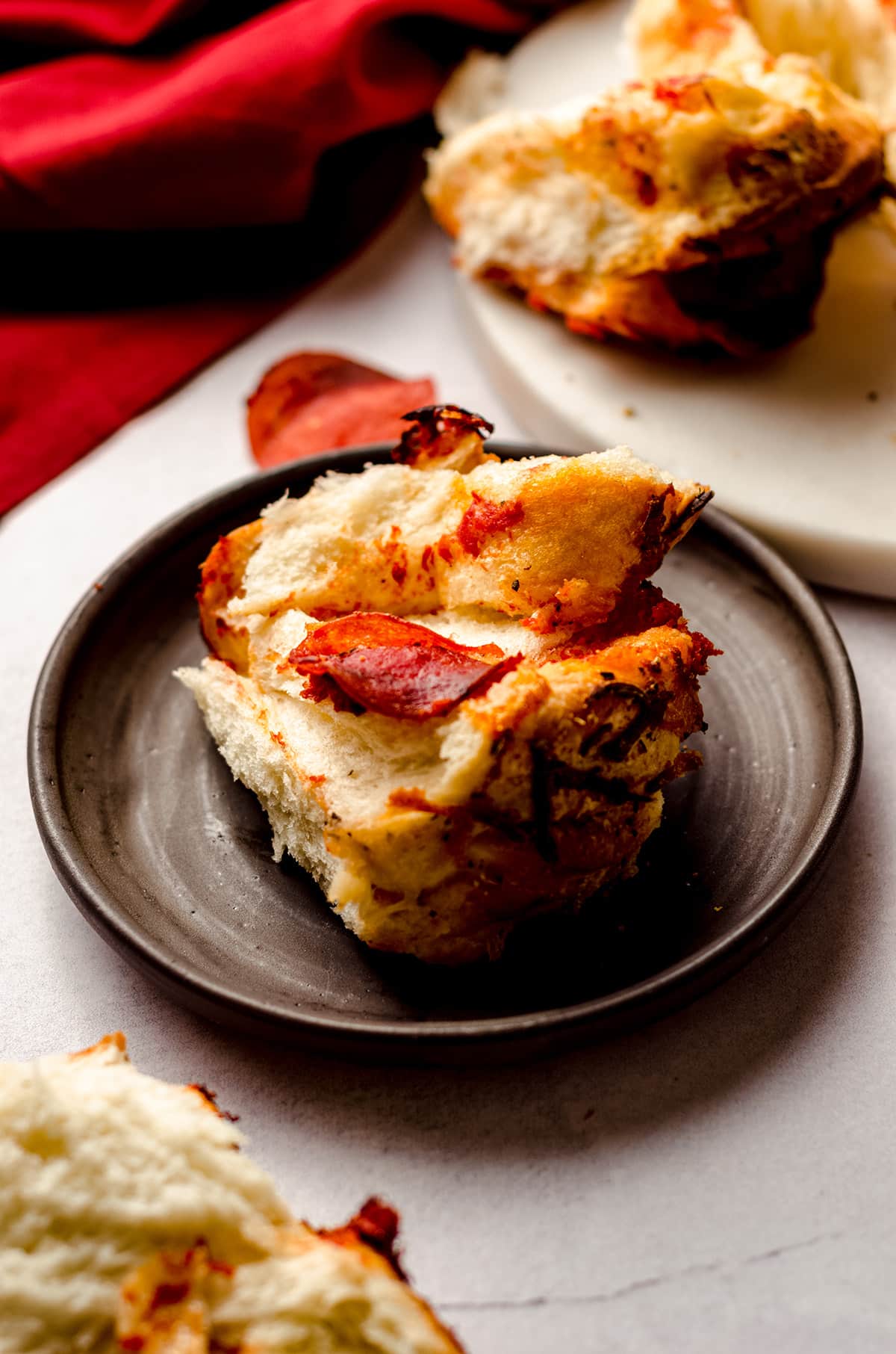 slice of pizza pull apart bread on a plate
