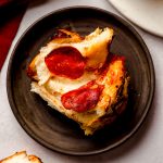 slice of pizza pull apart bread on a plate