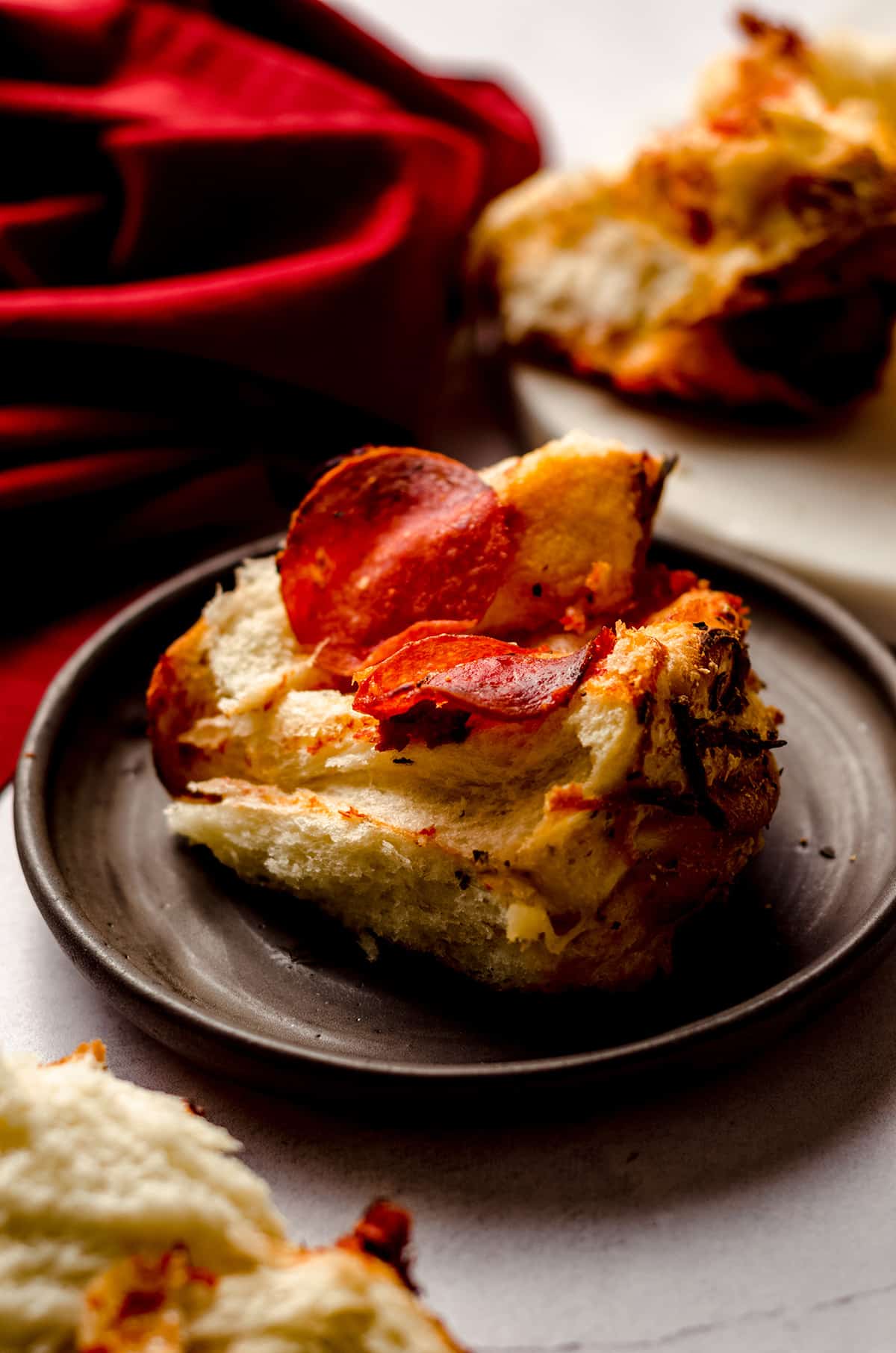 slice of pizza pull apart bread on a plate