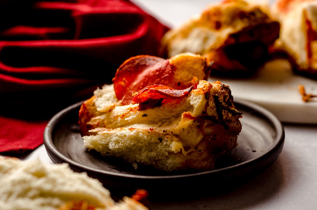 slice of pizza pull apart bread on a plate