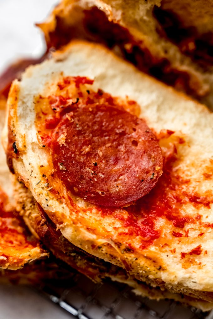 Pizza pull-apart bread that has been pulled apart.